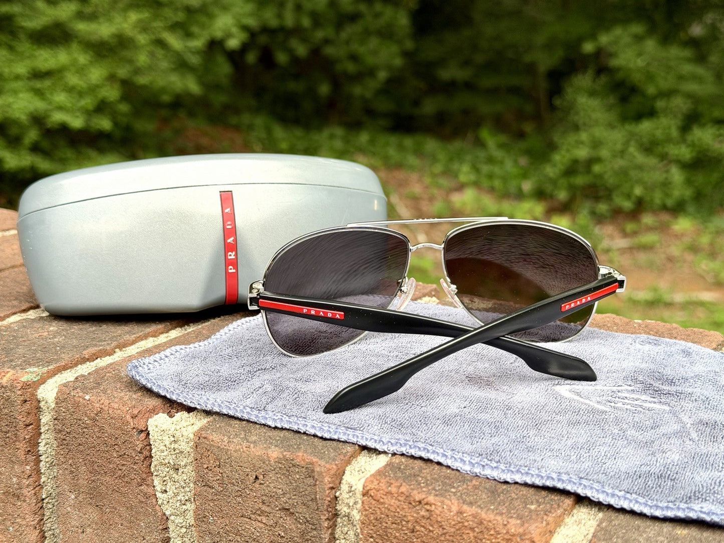 Prada Linea Rossa PS 53PS 1BC5W1 Steel Sunglasses Tinted Polarized Lens
