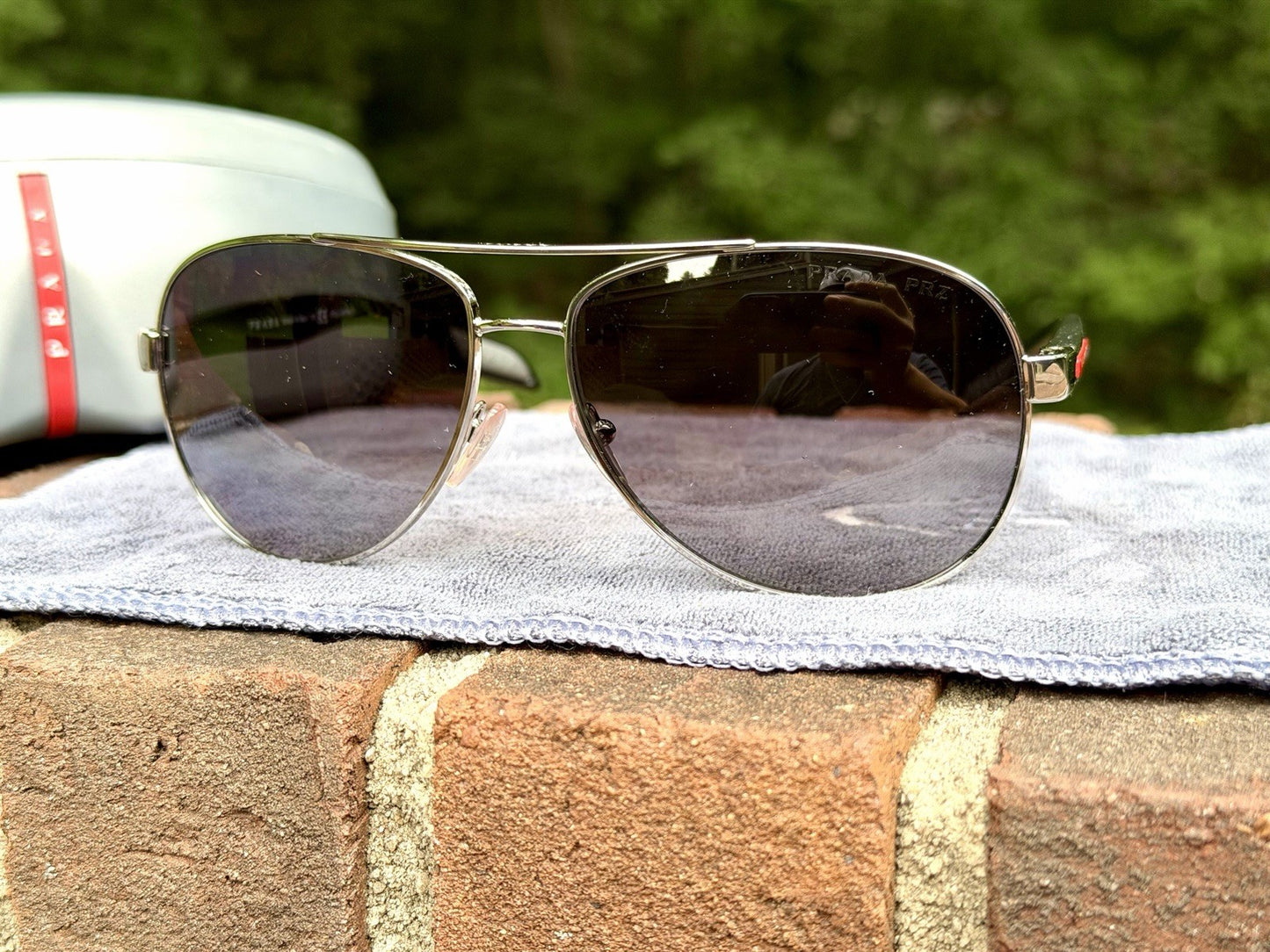 Prada Linea Rossa PS 53PS 1BC5W1 Steel Sunglasses Tinted Polarized Lens