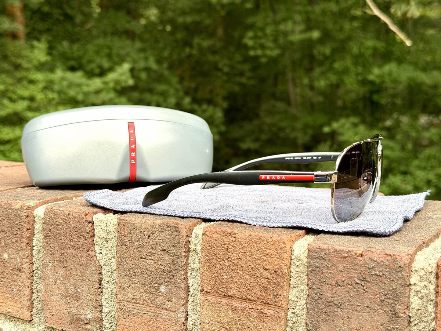 Prada Linea Rossa PS 53PS 1BC5W1 Steel Sunglasses Tinted Polarized Lens