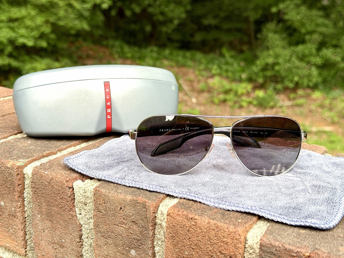Prada Linea Rossa PS 53PS 1BC5W1 Steel Sunglasses Tinted Polarized Lens