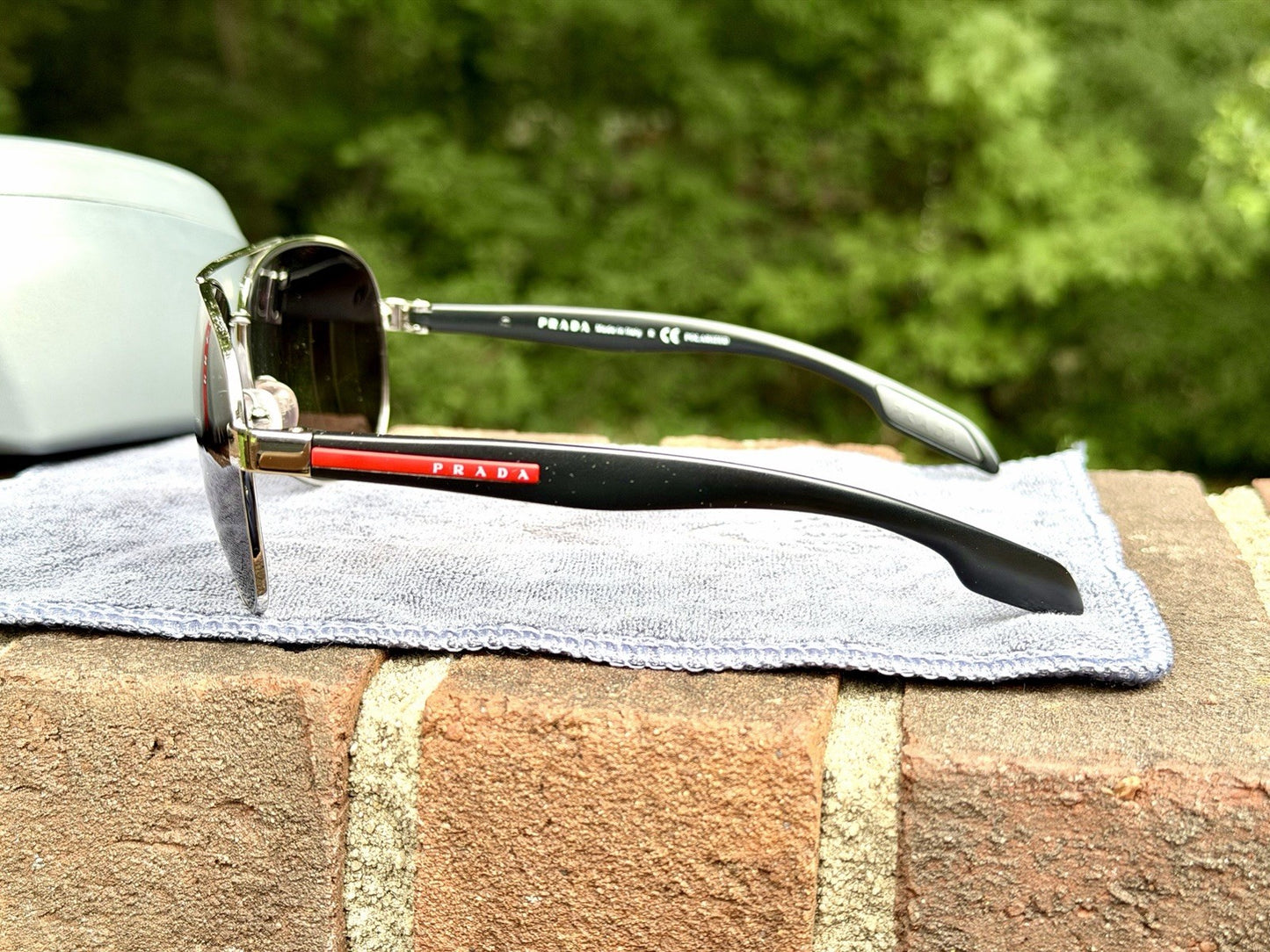 Prada Linea Rossa PS 53PS 1BC5W1 Steel Sunglasses Tinted Polarized Lens